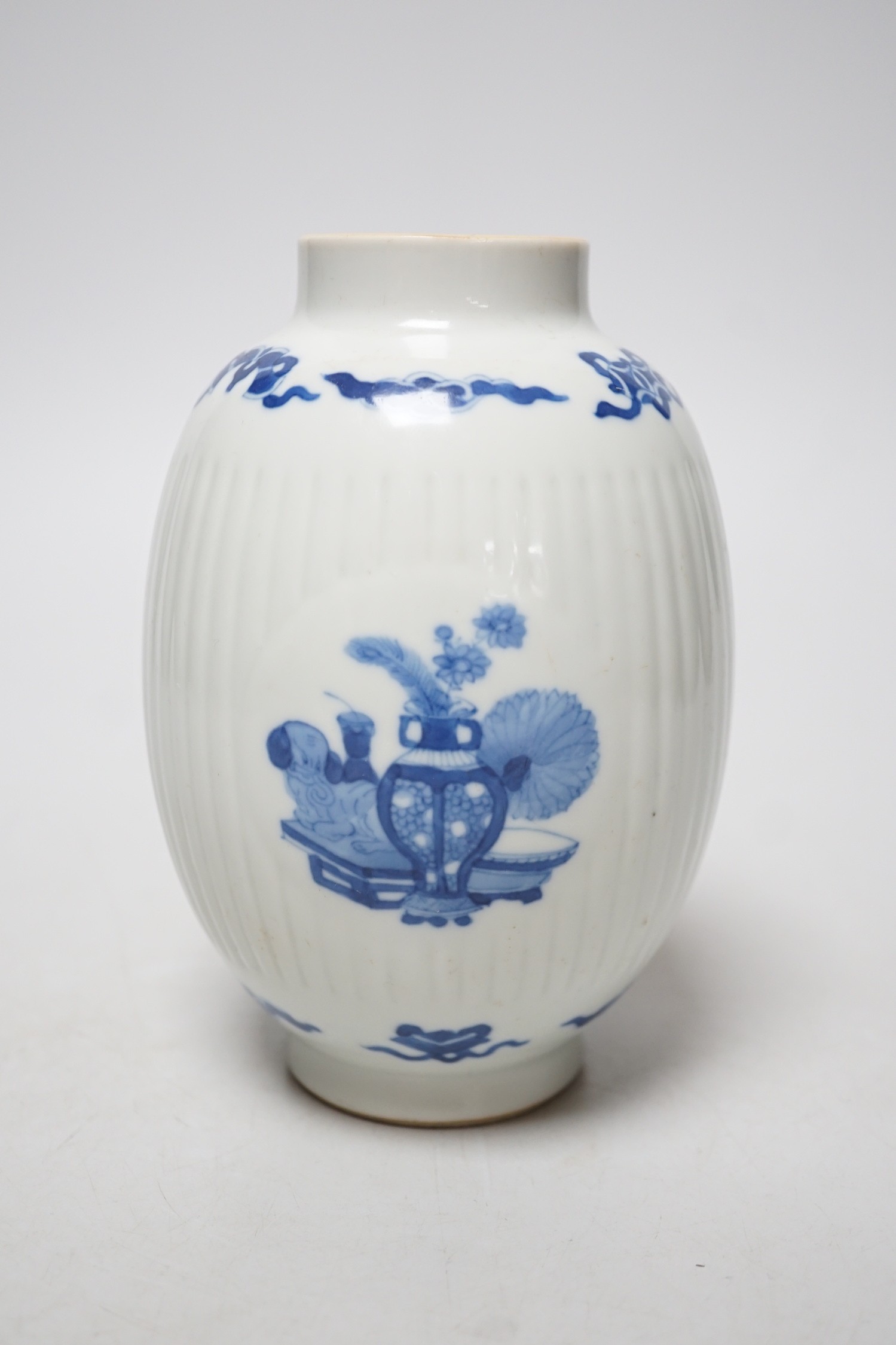 A Chinese blue and white fluted ovoid jar 16cm